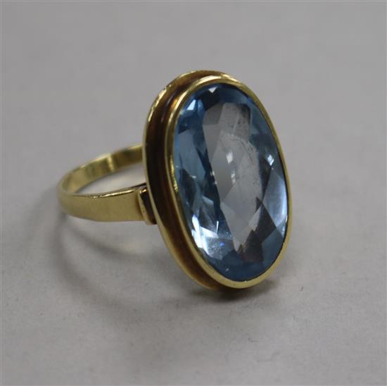 A 14ct gold and synthetic blue spinel? set dress ring, size T.